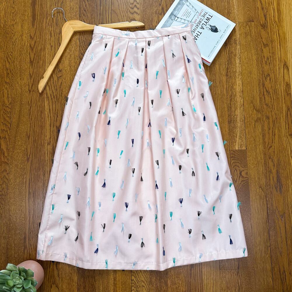 Eva Franco Light Pink A-Line Midi Skirt with Tiny Tassel Details